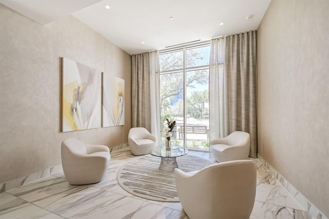 3333 Allen Pkwy Unit 1804, Houston, TX 77019 - living area with a wall of windows, marble tiled floors, and recessed lighting