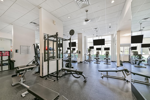 3333 Allen Pkwy Unit 1804, Houston, TX 77019 - gym featuring a paneled ceiling and a towering ceiling