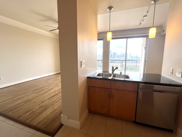 3333 Allen Pkwy Unit 1804, Houston, TX 77019 - kitchen featuring dishwasher, a skyline view, light tile patterned flooring, a ceiling fan, and ornamental molding