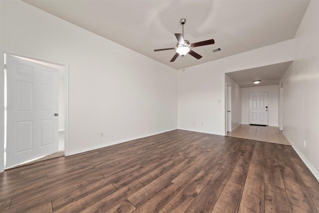 6906 Chessgate Falls Ln, Rosenberg, TX 77469 - spare room with baseboards, visible vents, wood finished floors, and a ceiling fan