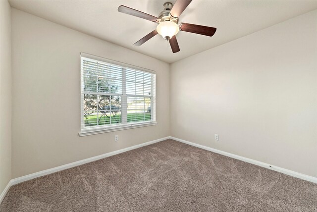 6906 Chessgate Falls Ln, Rosenberg, TX 77469 - carpeted empty room with baseboards and ceiling fan