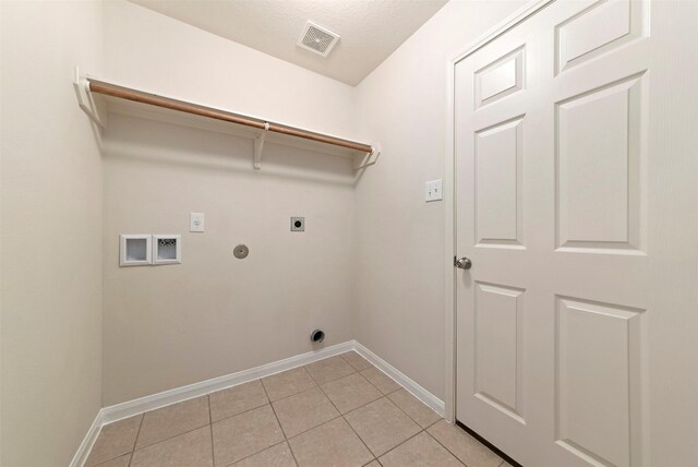 6906 Chessgate Falls Ln, Rosenberg, TX 77469 - clothes washing area featuring light tile patterned flooring, visible vents, washer hookup, laundry area, and electric dryer hookup