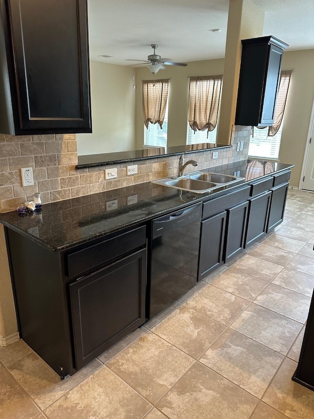 13830 Bonner Bluff Ln, Houston, TX 77047 - kitchen featuring a ceiling fan, a sink, dark stone countertops, tasteful backsplash, and black dishwasher