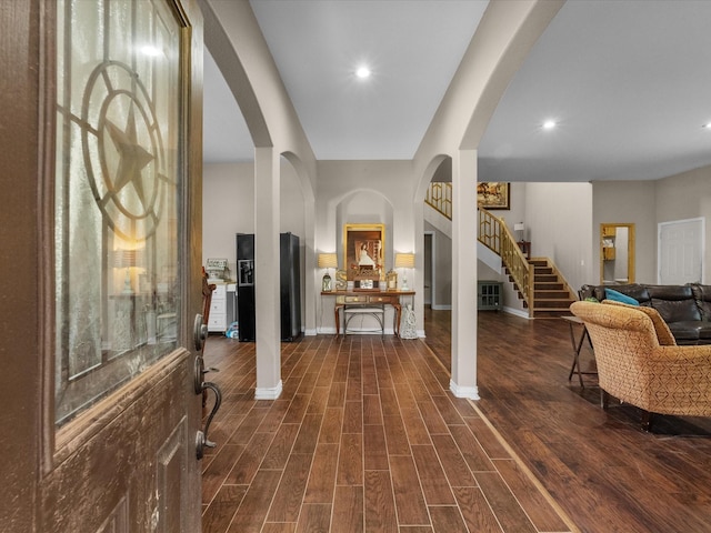 1151 County Line Rd, Shepherd, TX 77371 - entrance foyer with dark wood-style floors, recessed lighting, stairs, and baseboards