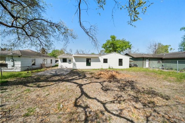 5610 Belarbor St, Houston, TX 77033 - rear view of house featuring fence