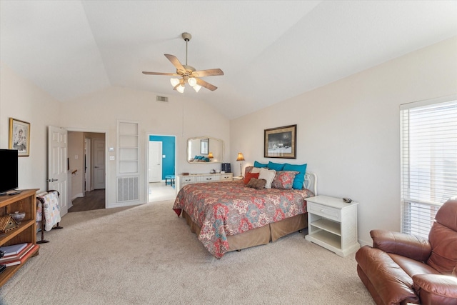 bedroom with visible vents, carpet flooring, a ceiling fan, and lofted ceiling