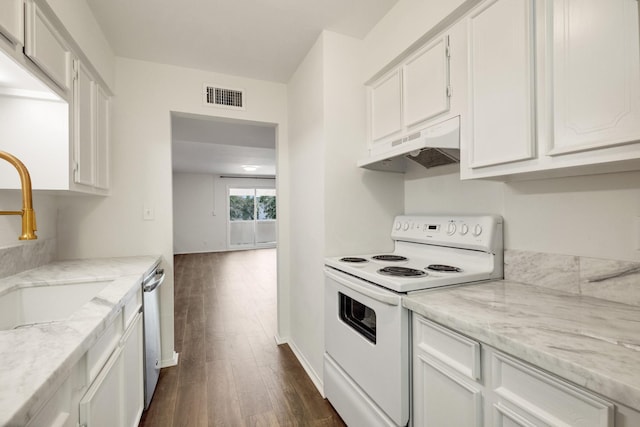 215 Postoffice St Unit 702, Galveston, TX 77550 - kitchen with white electric range oven, under cabinet range hood, dark wood-style flooring, a sink, and white cabinets