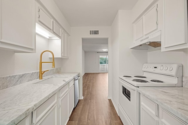 215 Postoffice St Unit 702, Galveston, TX 77550 - kitchen with white range with electric stovetop, under cabinet range hood, a sink, stainless steel dishwasher, and wood finished floors