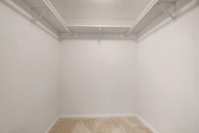 215 Postoffice St Unit 702, Galveston, TX 77550 - spacious closet featuring light colored carpet