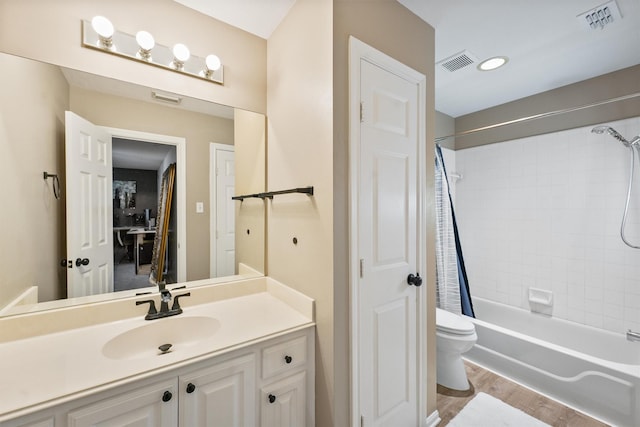 1518 Honea Egypt Rd, Magnolia, TX 77354 - full bathroom featuring visible vents, toilet, and wood finished floors