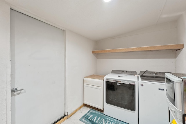 1518 Honea Egypt Rd, Magnolia, TX 77354 - clothes washing area with independent washer and dryer and cabinet space