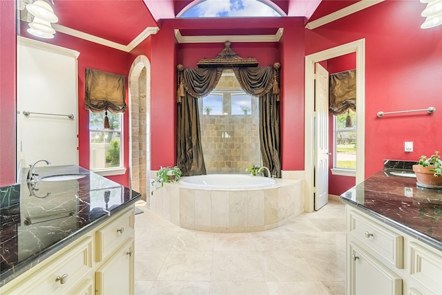 843 Royal Lakes Blvd, Richmond, TX 77469 - bathroom featuring vanity, a garden tub, and ornamental molding