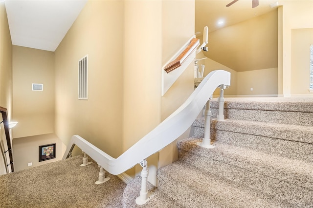843 Royal Lakes Blvd, Richmond, TX 77469 - stairs with visible vents, lofted ceiling, carpet flooring, and a ceiling fan