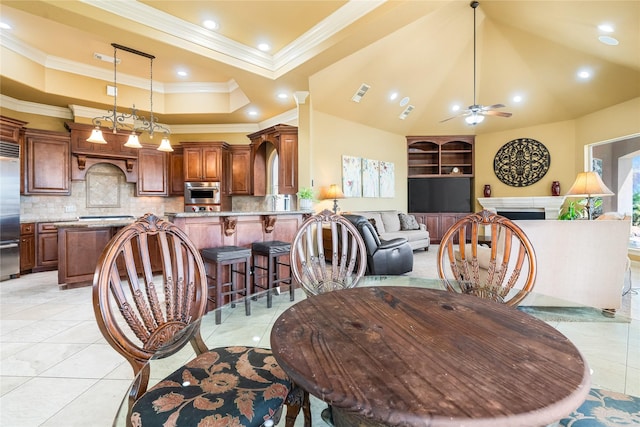843 Royal Lakes Blvd, Richmond, TX 77469 - dining space featuring visible vents, a fireplace, crown molding, a raised ceiling, and ceiling fan
