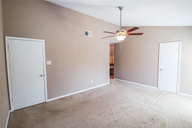 2211 S Kirkwood Rd Unit 51, Houston, TX 77077 - empty room featuring ceiling fan, visible vents, baseboards, lofted ceiling, and carpet