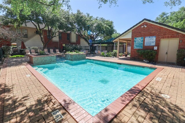 2211 S Kirkwood Rd Unit 51, Houston, TX 77077 - community pool with a patio