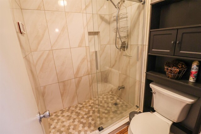 2211 S Kirkwood Rd Unit 51, Houston, TX 77077 - bathroom featuring toilet and a stall shower