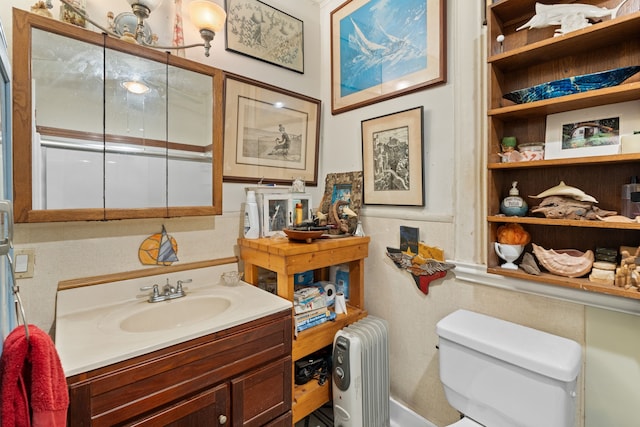 916 Sealy St, Galveston, TX 77550 - bathroom with toilet, radiator, and vanity