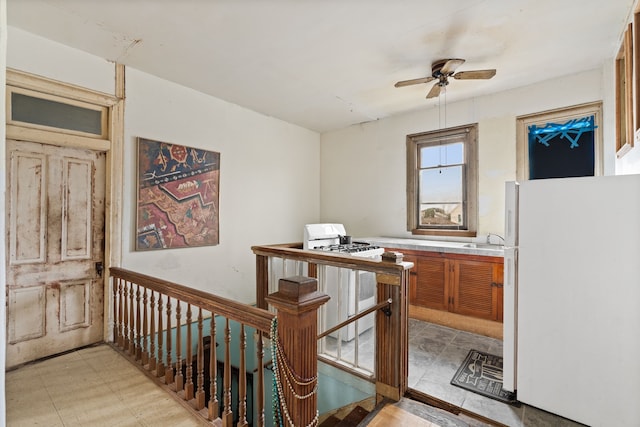 916 Sealy St, Galveston, TX 77550 - kitchen with a sink, white appliances, and ceiling fan