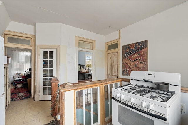 916 Sealy St, Galveston, TX 77550 - kitchen featuring white gas range oven