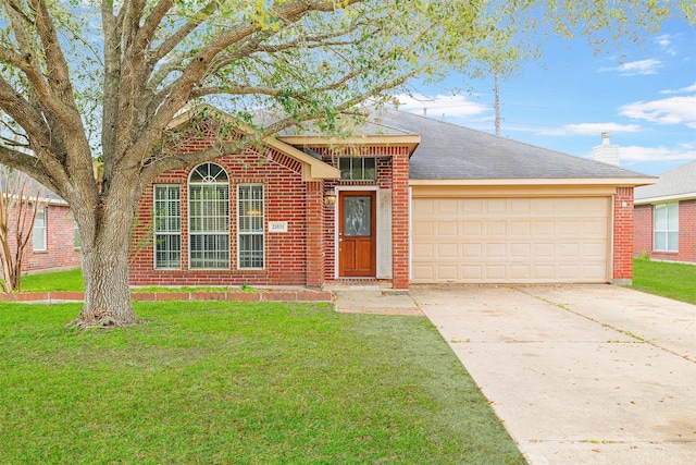 single story home featuring brick siding, an attached garage, concrete driveway, and a front yard
