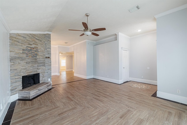 unfurnished living room featuring ornamental molding, baseboards, visible vents, and ceiling fan