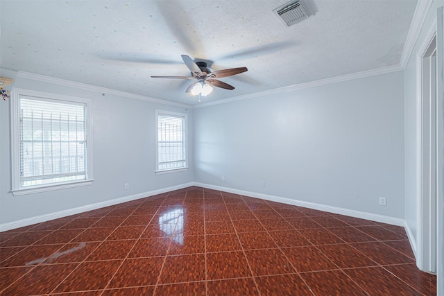 empty room featuring visible vents, baseboards, ceiling fan, and ornamental molding