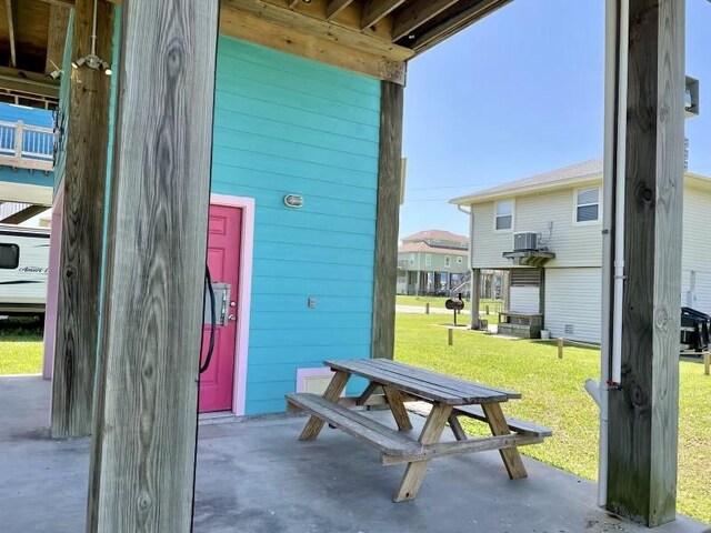 view of patio with central air condition unit and a residential view