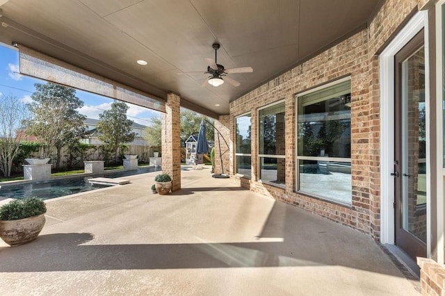 1038 Bolivar Point Ln, Friendswood, TX 77546 - view of patio featuring fence and a ceiling fan