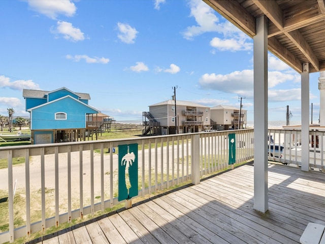 127 Howard, Surfside Beach, TX 77541 - wooden deck featuring a garage
