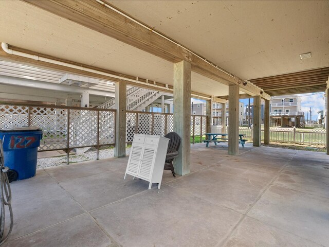 127 Howard, Surfside Beach, TX 77541 - view of patio with fence and stairway