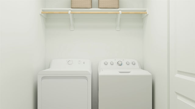 5823 Sandpiper Loop, Baytown, TX 77521 - laundry room with washing machine and dryer