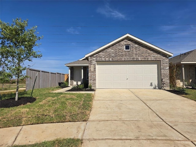 5823 Sandpiper Loop, Baytown, TX 77521 - ranch-style house with brick siding, driveway, an attached garage, and a front lawn
