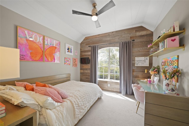 9219 Hummingbird Ln, Missouri City, TX 77459 - carpeted bedroom featuring wood walls, a ceiling fan, and vaulted ceiling