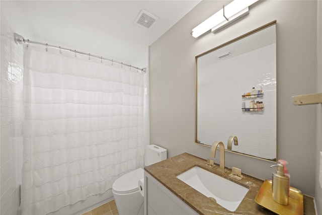 9219 Hummingbird Ln, Missouri City, TX 77459 - bathroom featuring visible vents, toilet, and vanity