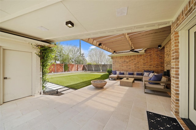 9219 Hummingbird Ln, Missouri City, TX 77459 - view of patio featuring outdoor lounge area, a fenced backyard, and a ceiling fan