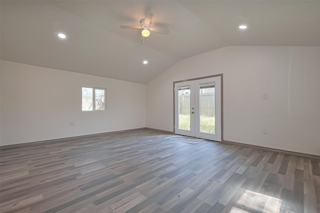 spare room with french doors, a ceiling fan, vaulted ceiling, and a wealth of natural light