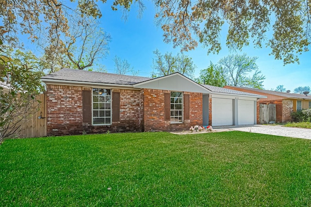 ranch-style house with driveway, a front yard, a garage, and brick siding