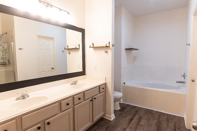 30615 S Sulphur Creek Dr, Magnolia, TX 77355 - full bathroom with a sink, toilet, wood finished floors, and a bath