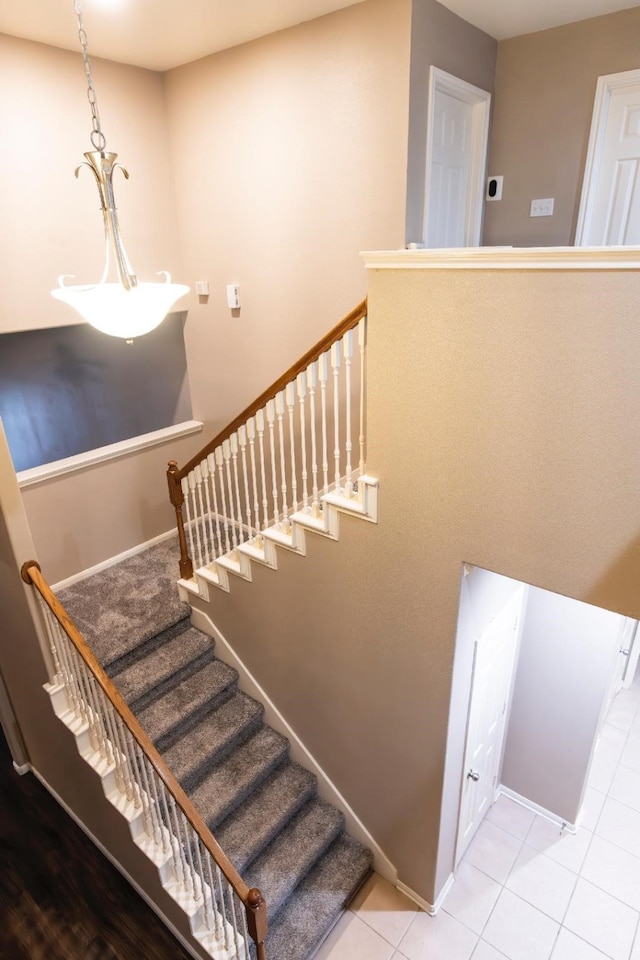 30615 S Sulphur Creek Dr, Magnolia, TX 77355 - stairs featuring tile patterned floors and baseboards