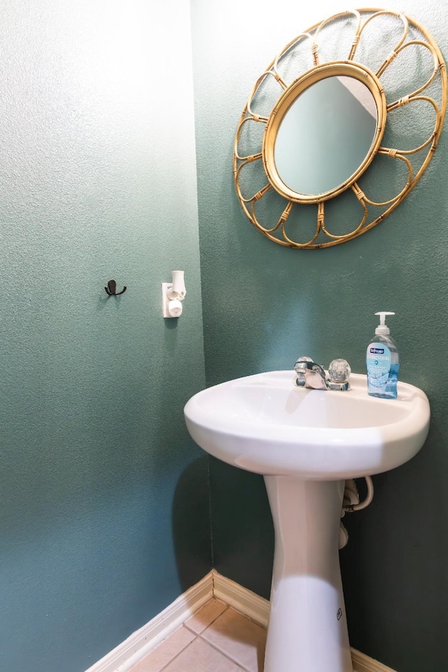 30615 S Sulphur Creek Dr, Magnolia, TX 77355 - bathroom featuring baseboards and tile patterned flooring
