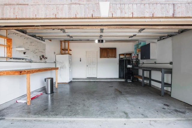 30615 S Sulphur Creek Dr, Magnolia, TX 77355 - garage featuring a garage door opener and white fridge with ice dispenser