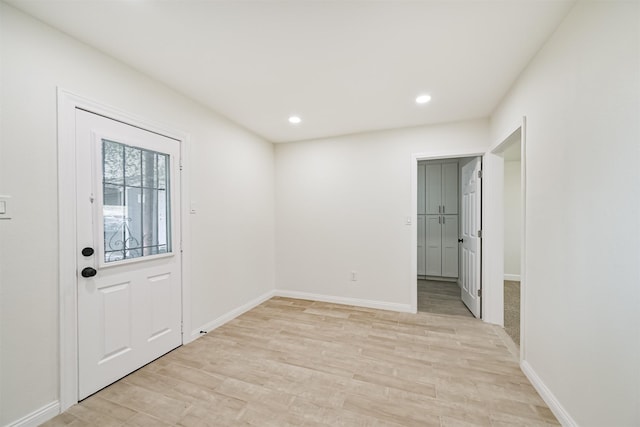 7119 Lumber Jack Dr, Houston, TX 77040 - unfurnished room with light wood-style floors, recessed lighting, and baseboards