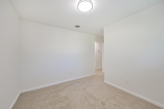 7119 Lumber Jack Dr, Houston, TX 77040 - unfurnished room featuring light carpet and baseboards
