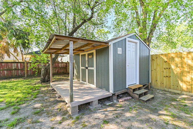 7119 Lumber Jack Dr, Houston, TX 77040 - view of shed with a fenced backyard and entry steps