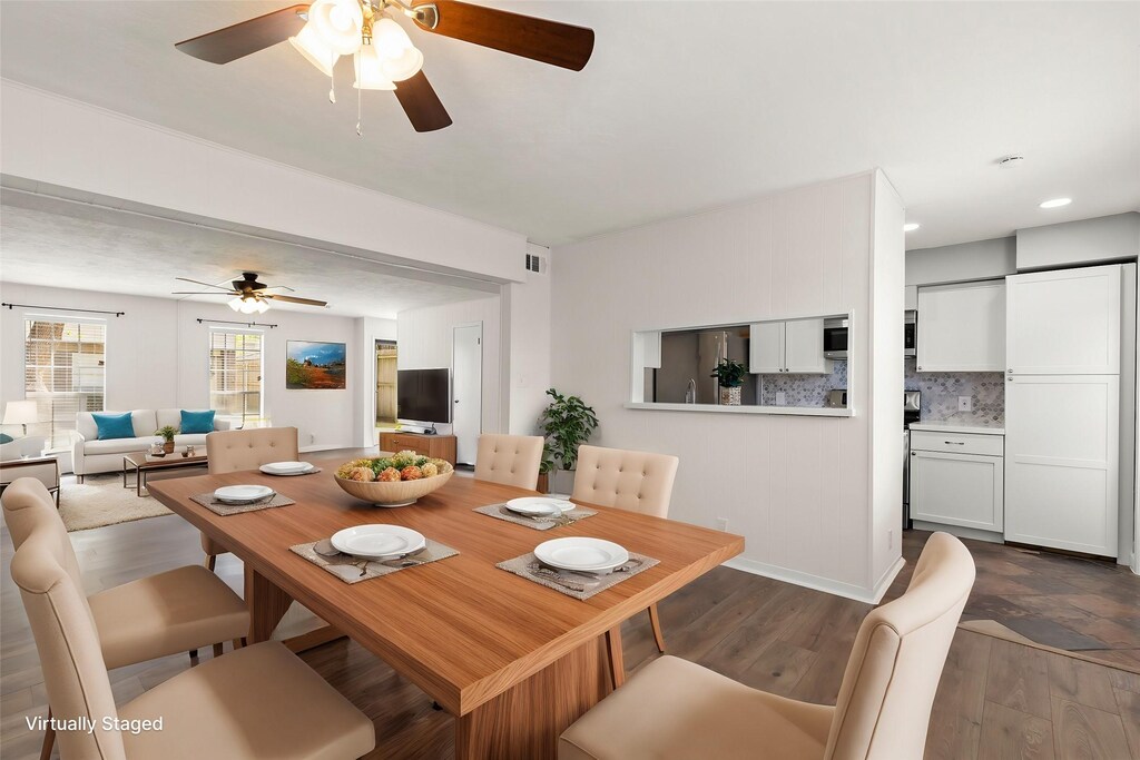 8101 Amelia Rd Unit 509, Houston, TX 77055 - dining room with dark wood-style flooring and a ceiling fan