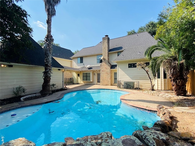 14959 Royal Birkdale St, Houston, TX 77095 - outdoor pool with a patio area and fence