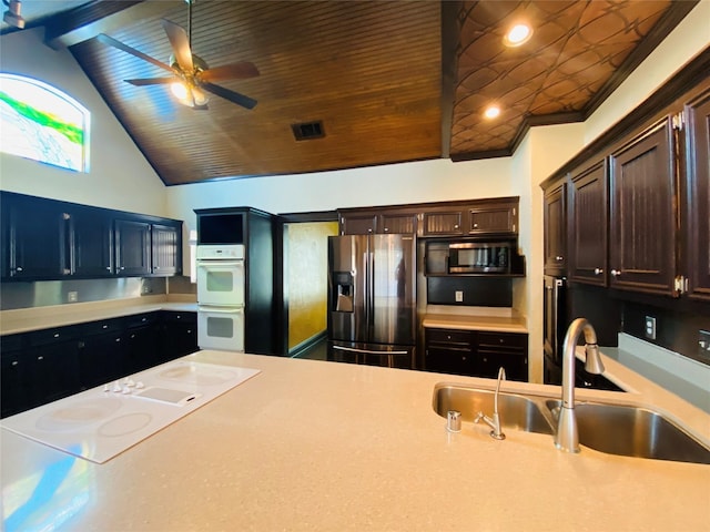 14959 Royal Birkdale St, Houston, TX 77095 - kitchen with light countertops, visible vents, white appliances, a ceiling fan, and a sink