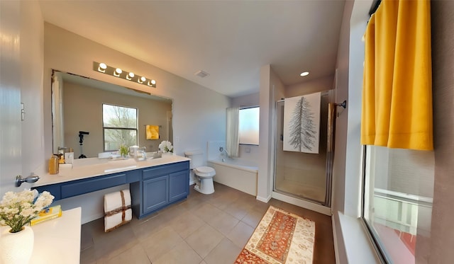 full bathroom with visible vents, a stall shower, toilet, tile patterned floors, and vanity