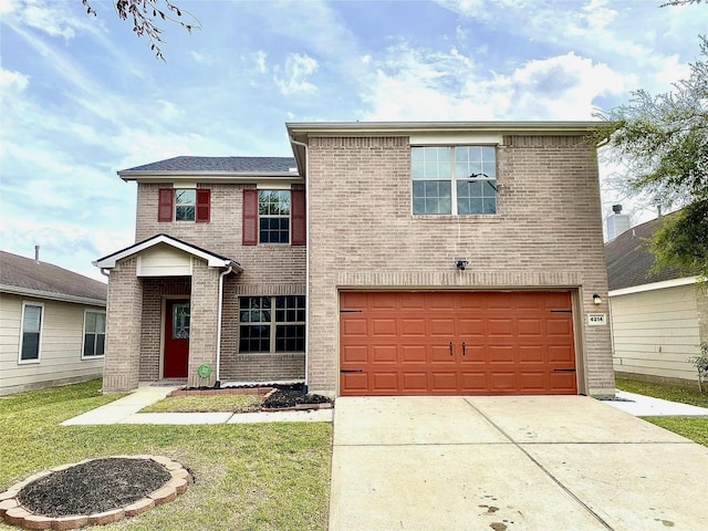 traditional-style home with a garage, brick siding, a front lawn, and concrete driveway